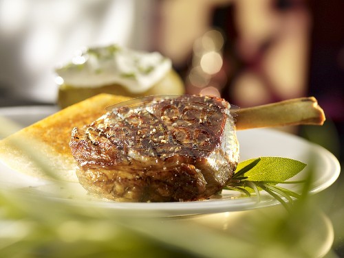 Grilled veal chop with accompaniments-391763