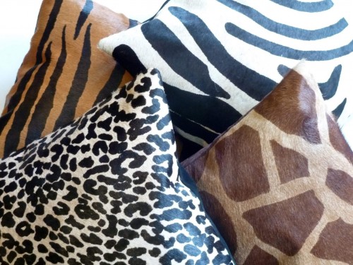 animal printed cow hide pillows