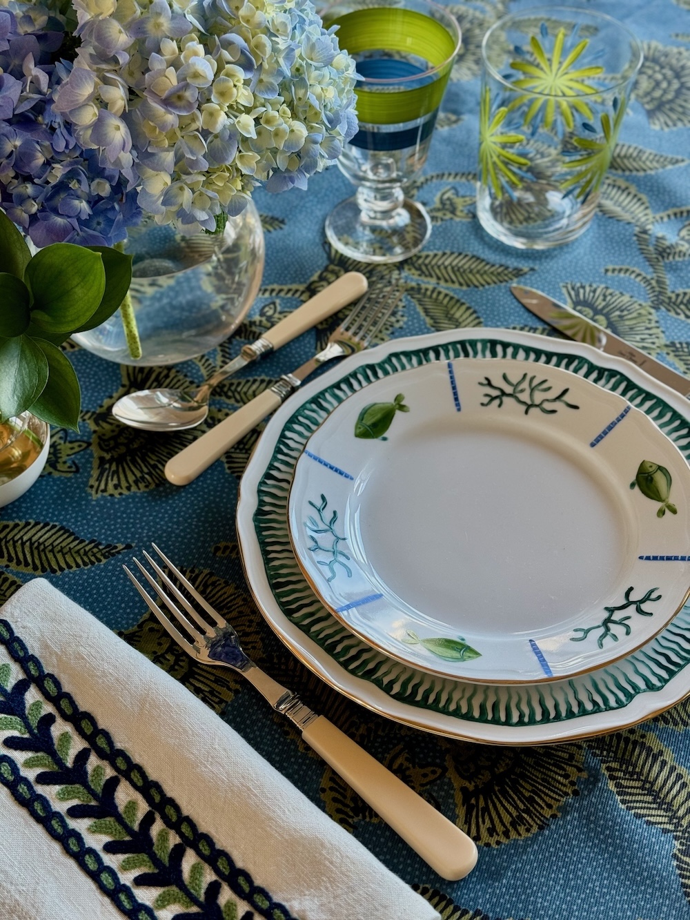 Hand painted dinnerware via Quintessence