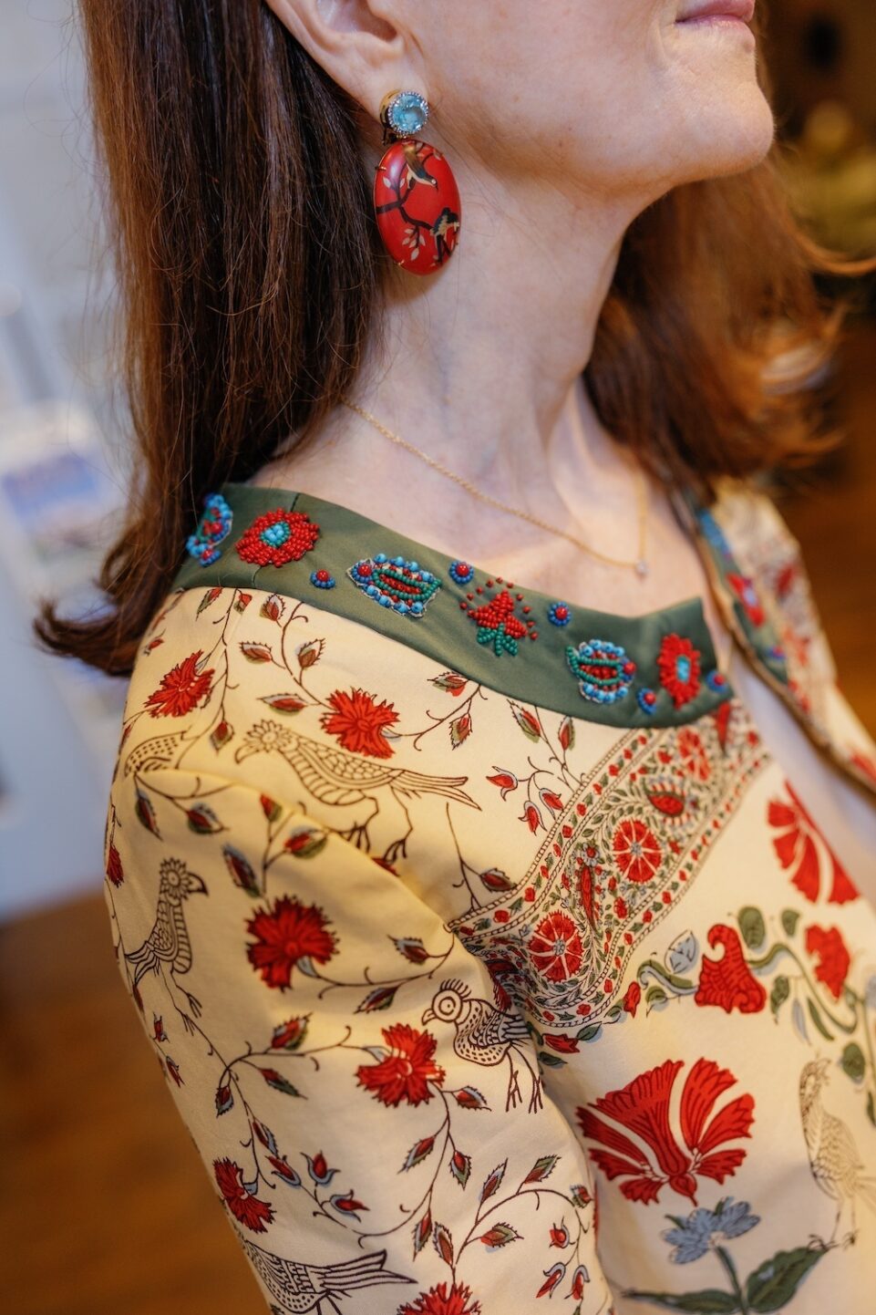 Stacey Bewkes of Quintessence in sylvia furmanovich earrings and Pierre Frey jacket