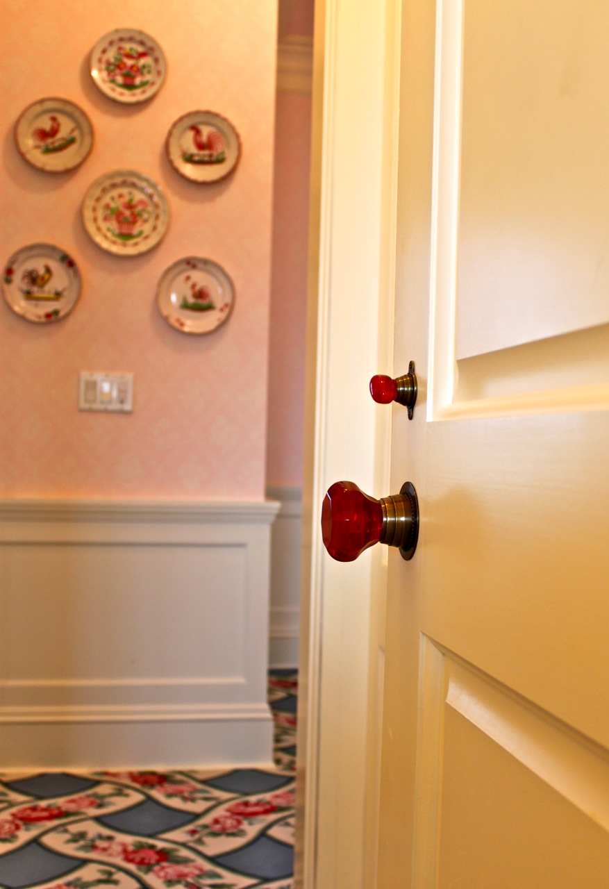 Cranberry doorknob in master suite of Diamond Baratta designed house Antique doorknobs