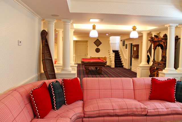 Game room in Diamond Baratta designed house Basement family room